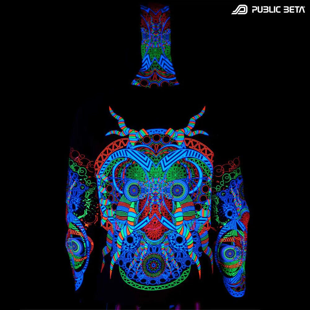 Hooded Sweater with UV-reactive graphics glowing under blacklight