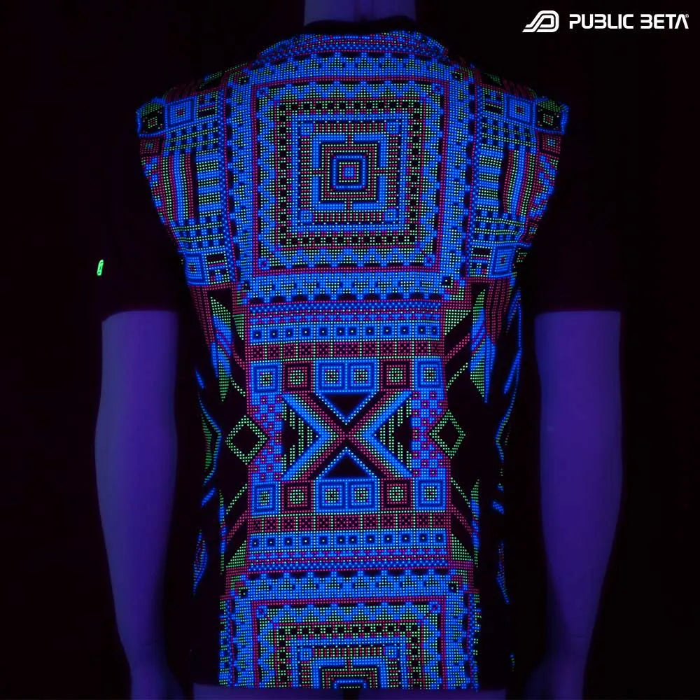 T-shirt with dense pattern UV-reactive graphics glowing under blacklight