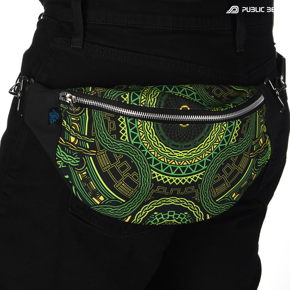 Bum bag with green and yellow geometric tribal mandala print, photographed in natural light