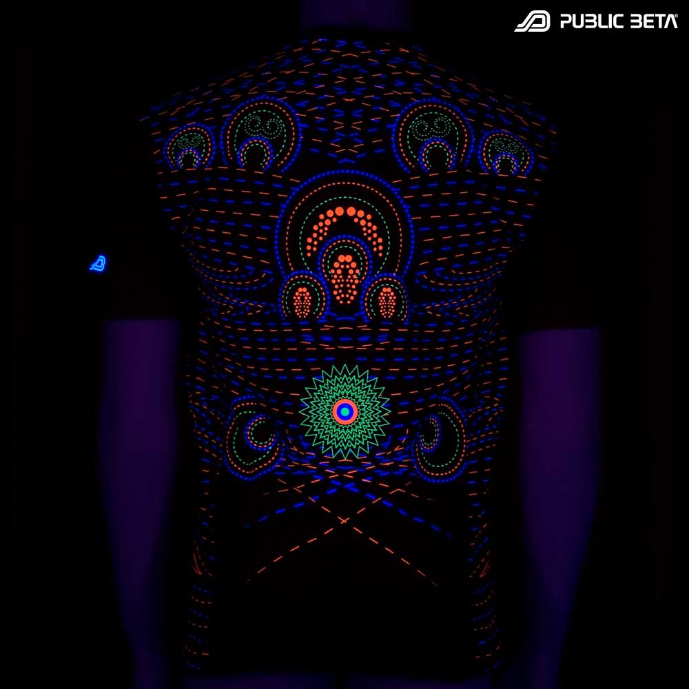 T-shirt with Hexodus UV-reactive graphics glowing under blacklight