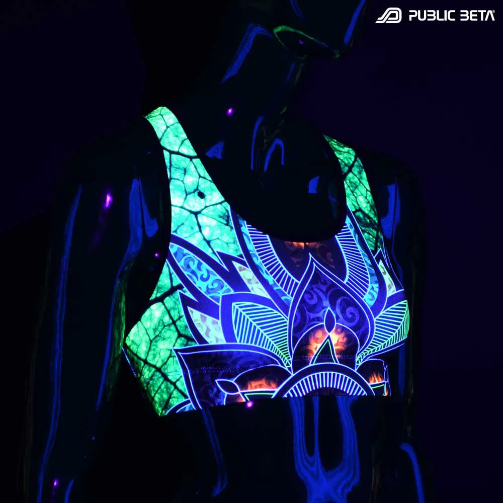 Active top with UV-reactive psychedelic art print glowing under blacklight
