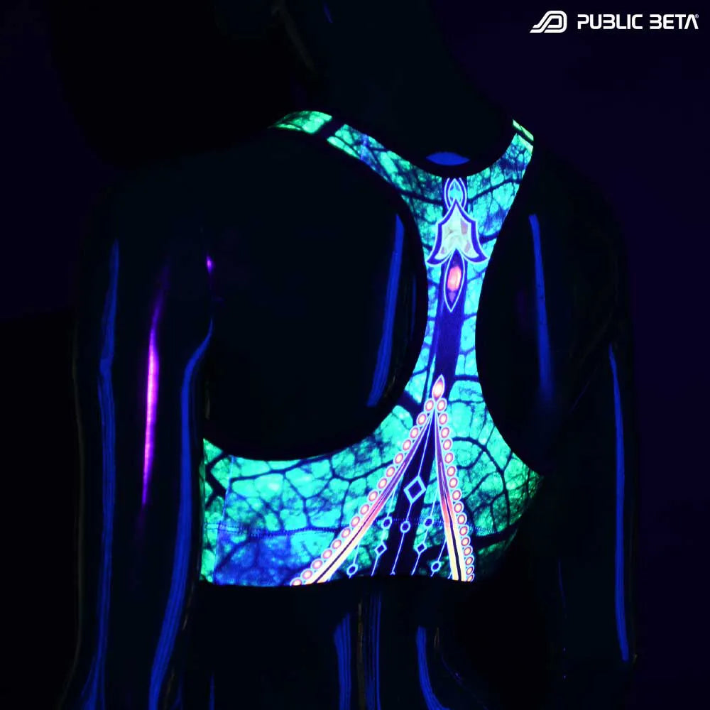 Active top with UV-reactive psychedelic art print glowing under blacklight
