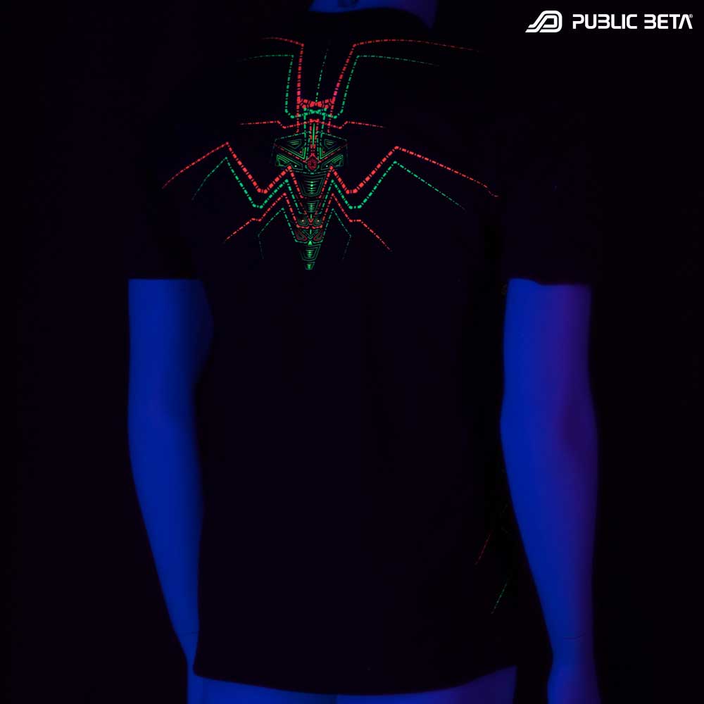 T-shirt with Lotus UV-reactive graphics glowing under blacklight