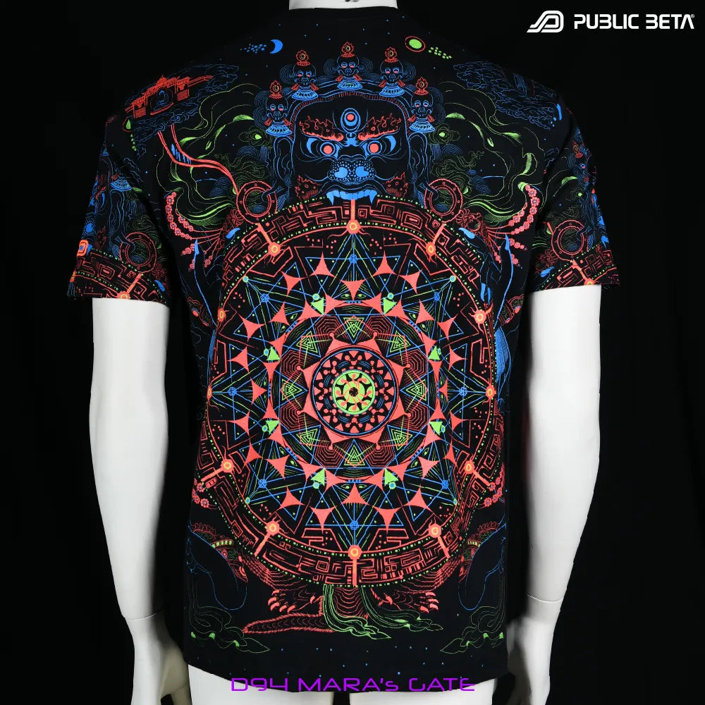 back of a T-shirt with geometric UV-reactive graphics, photographed in natural light