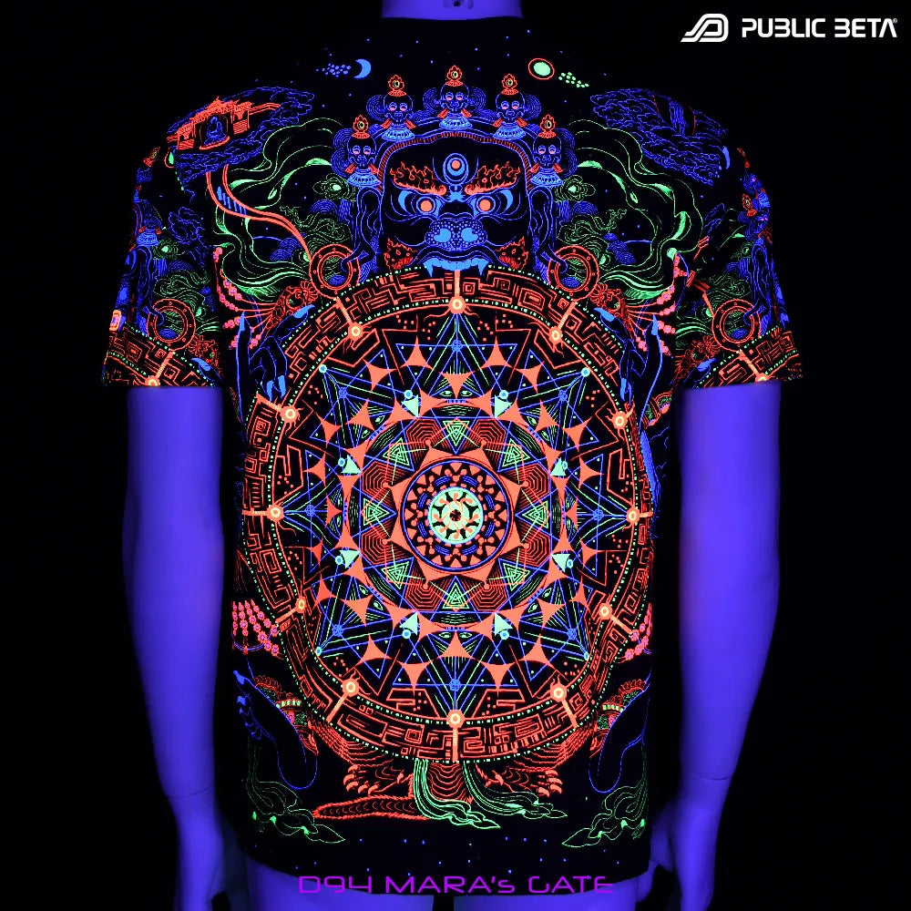 Back of a T-shirt with all-over UV-reactive print glowing under blacklight