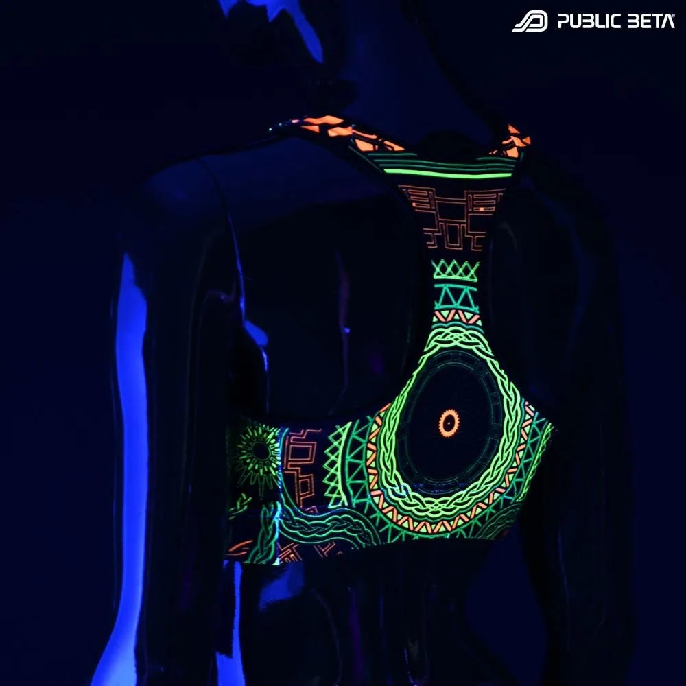 Active top with geometric UV-reactive graphics glowing under blacklight
