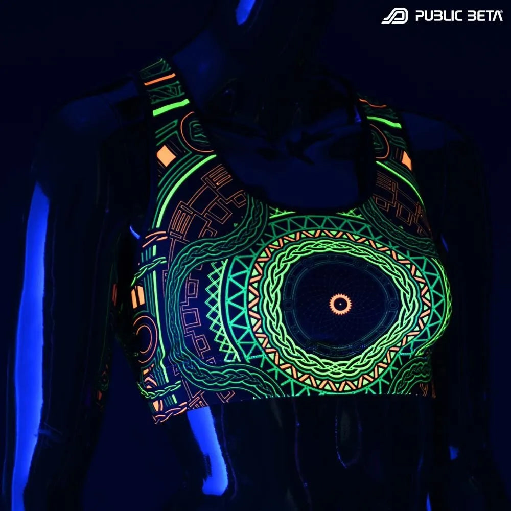 Active top with geometric UV-reactive graphics glowing under blacklight